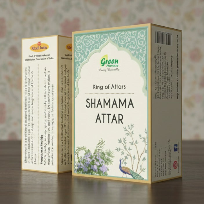 Two boxes of 'Shamama Attar' on a wooden surface with a floral-patterned wall in the background.