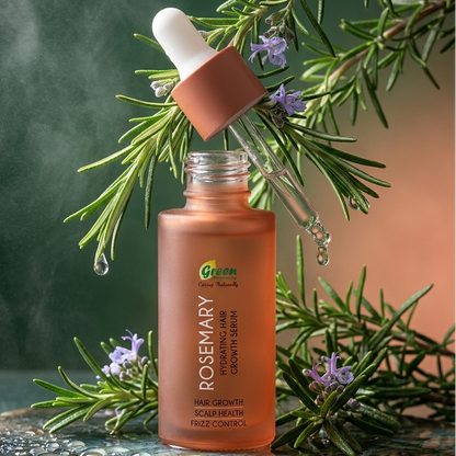 Rosemary hair growth serum bottle with dropper on a green background