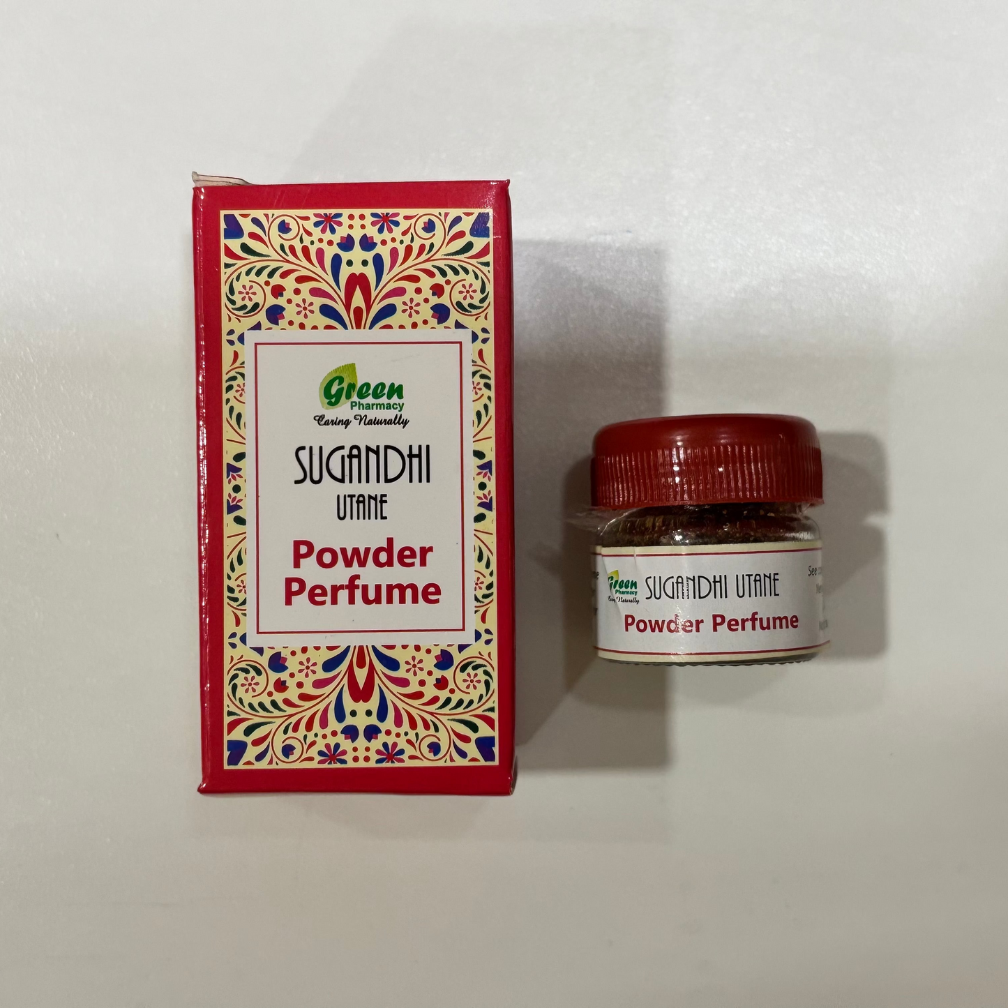 Sugandhi Powder Perfume packaging with decorative box on a white background
